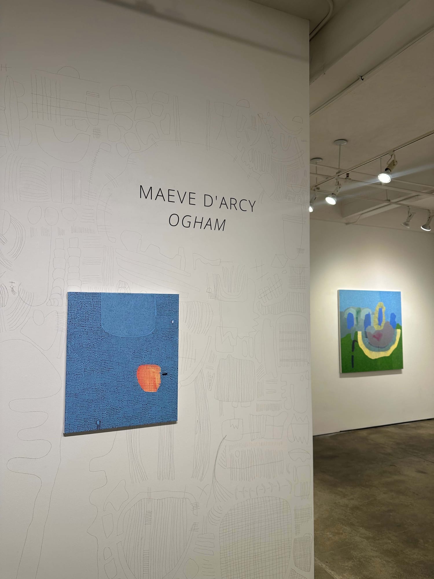 The exhibition: Ogham, by maeve d'arcy with two abstract paintings visible.