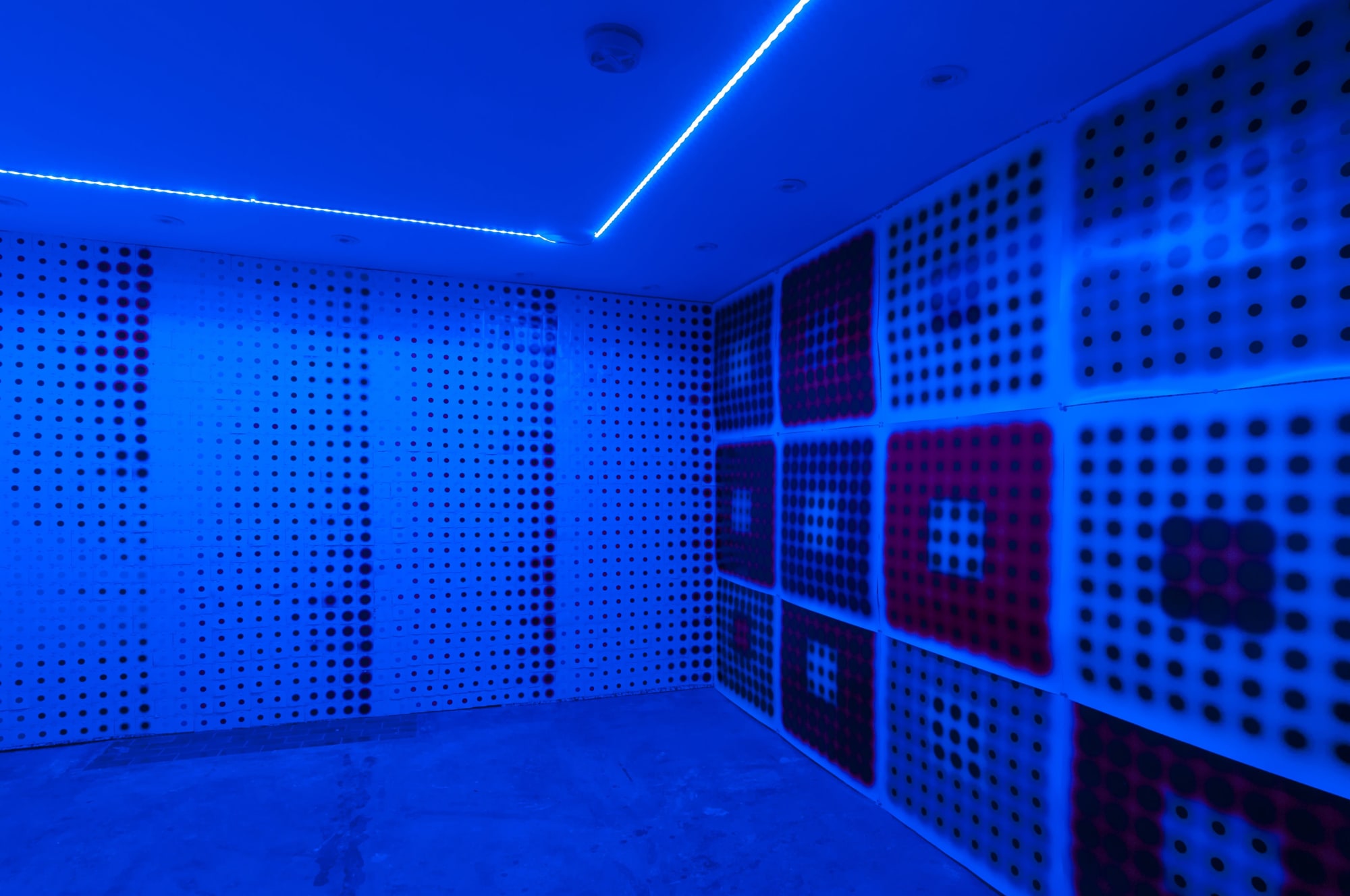 Site-specific installation with Light Movements prints and changing LED lights