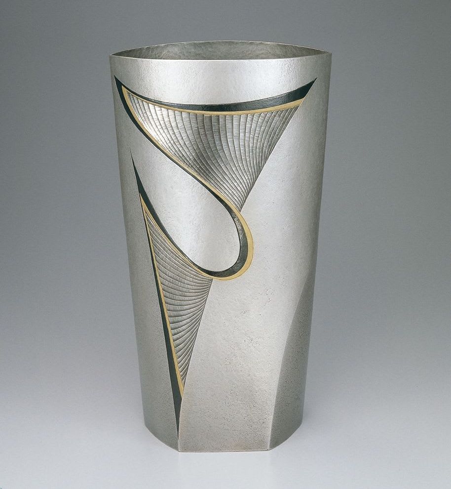 Silver Vase "Yo" (Leap), 1998 Silver metal carving with gold decoration and shakudo (alloy-copper, gold) 13 3/4 × 5 5/8 × 6 in (35 × 14.3 × 15.2 cm)