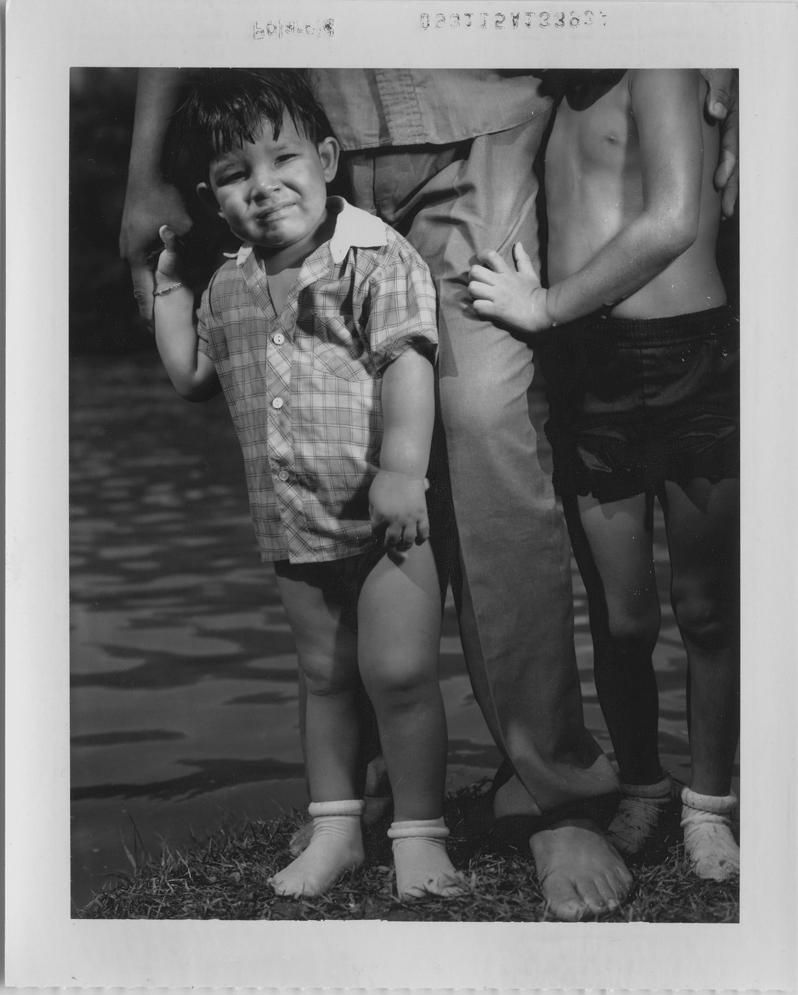 Max Aguilera-Hellweg BOY WITH FATHER AND BROTHER, RIO GRANDE, MEXICAN SIDE, II, 1989 Original Type 55 Polaroid (Unique) 4x5 inches (GCP31409)