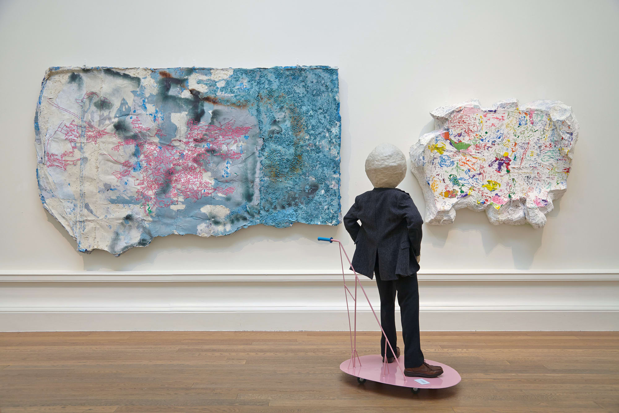 Laura Mcglinchey (wall) and Dennis J Reinmuller (foreground)