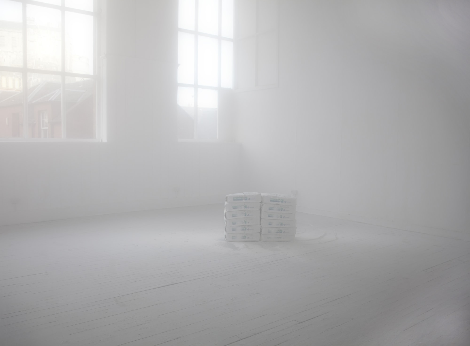 Lendita Xhemajli, 12 Bags of Plaster Chainsawed in Half, 2012