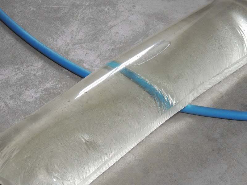 Cassia Dodman, Untitled (detail),2017, vacuum packing bag, water, MDPE pipe & vibrating motors