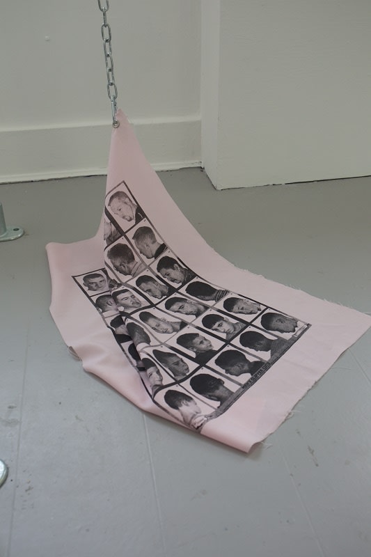 Robbie Campbell, Corporate Fun, 2017, screenprint on fabric and steel chain