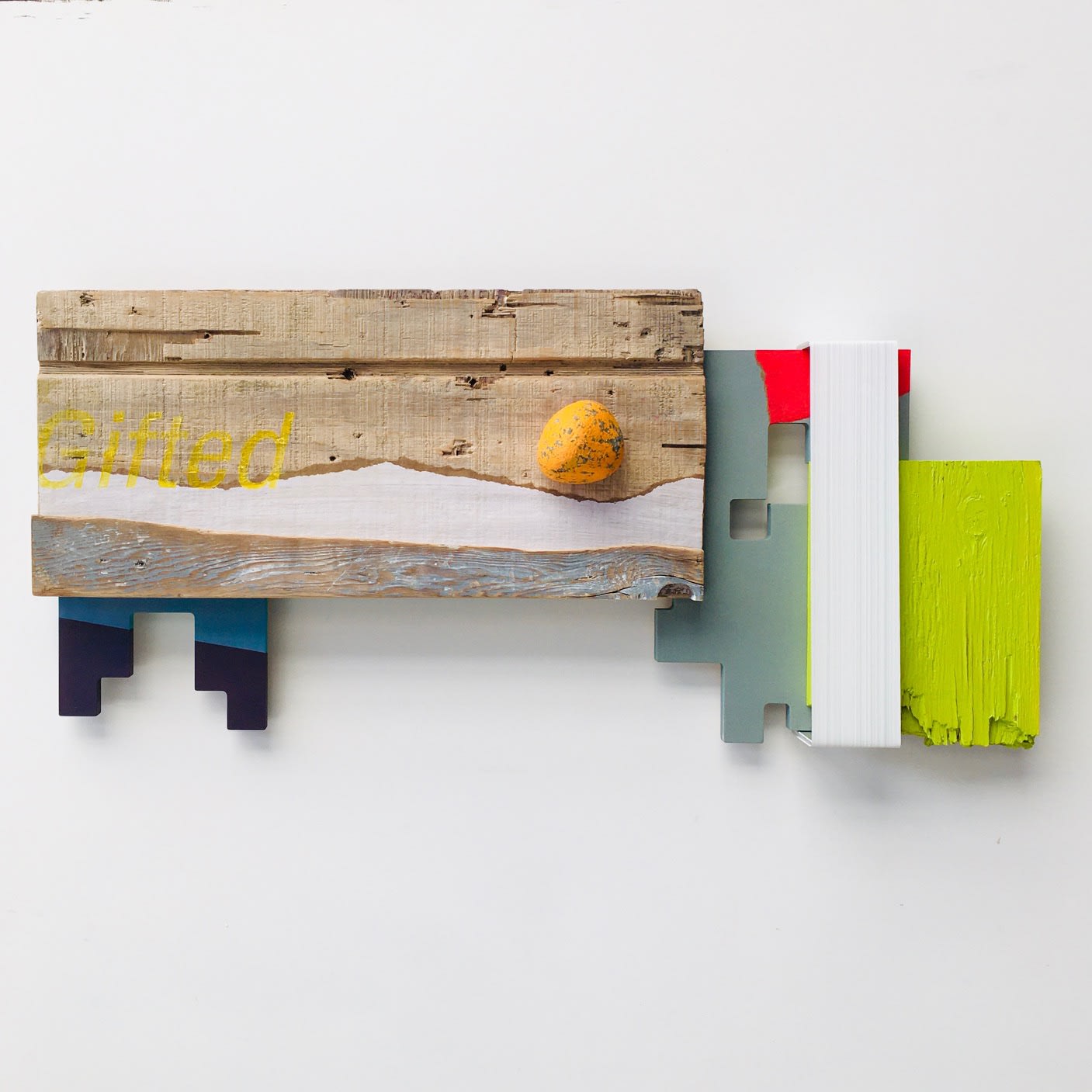 Andrés Ferrandis Gifted, 2020 Acrylic on wood, polyester, objet trouvé, a painted stone and aluminum 14 x 29 x 2.3" 35.6 x 73.7 x 5.7 cm