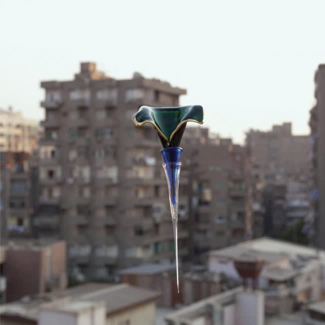 Hassan Khan, A Glass Object Photographed as a Way of Collecting the World Around It, 2013