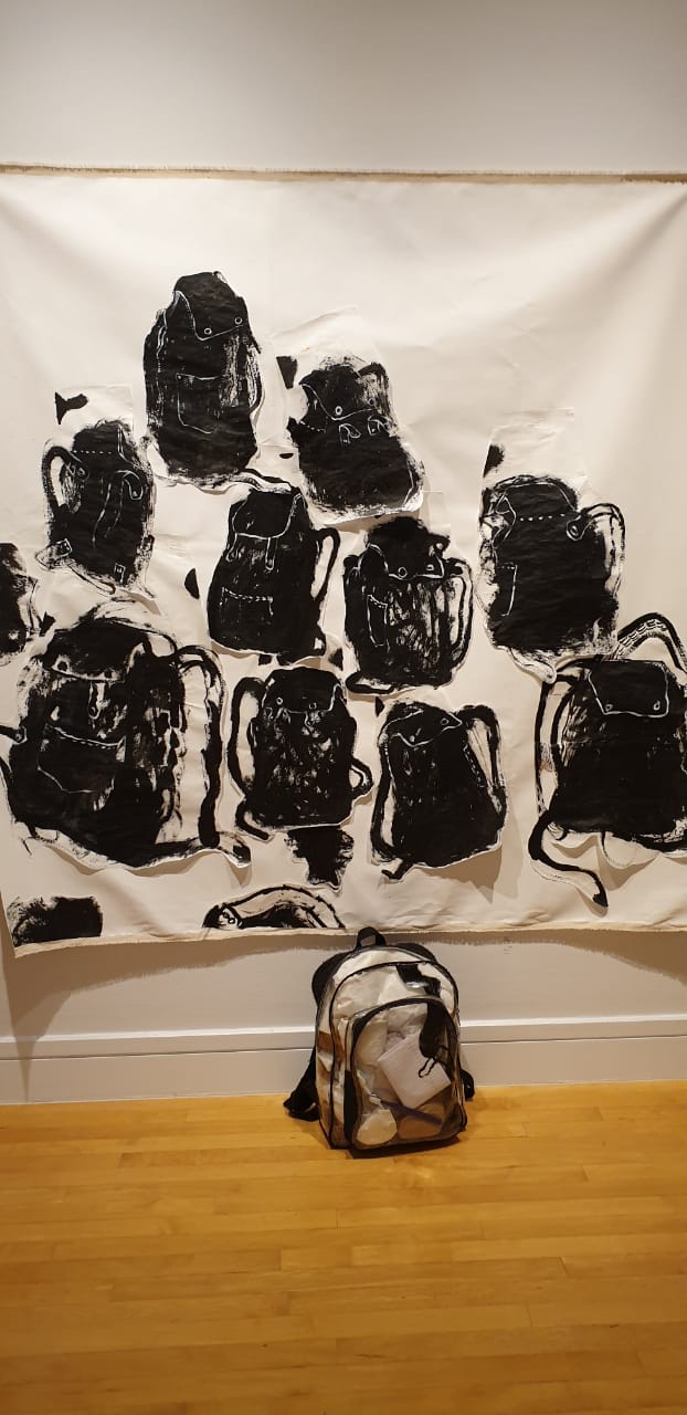 APRIL WORKS: BACKPACKS, BOMBS & BORDERS