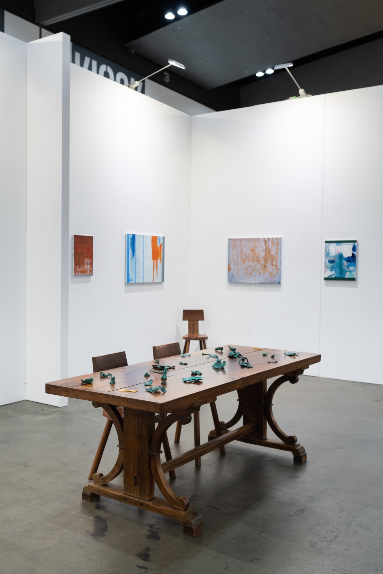 Installation view with works by Cindy Huang & Sandra Bushby. Sumer, Booth H2, Melbourne Art Fair. Photo: Phoebe Powell Normandy farmhouse kitchen table (circa 1850) courtesy of Miguel Meirelles Antiques; Alpine chairs from Laker Studio.