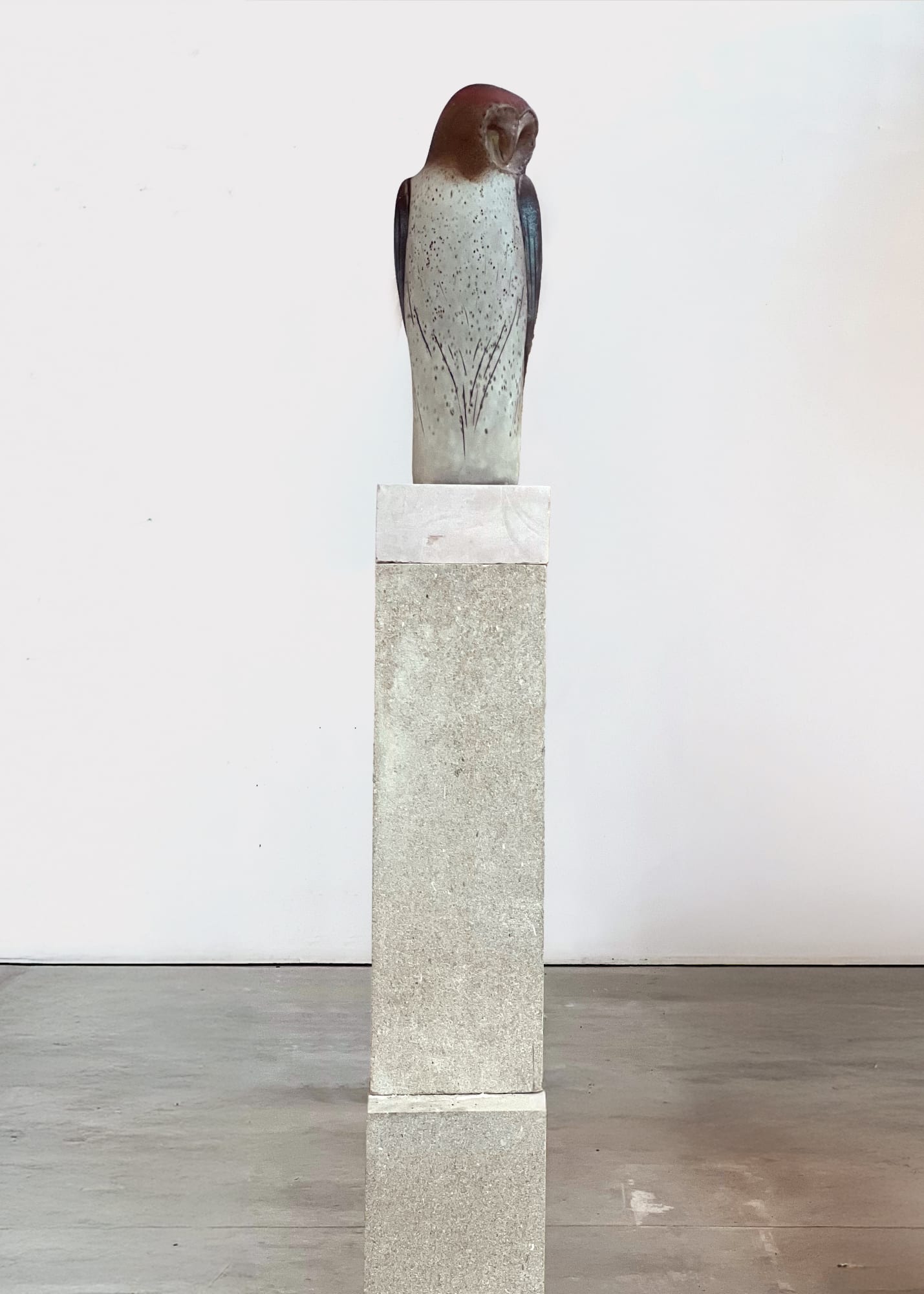 East Coast Owl, 2025 Hand blown carved and pigmented glass on Burgundy rose marble and French limestone 70 x 8 x 12 inches Figure: 19 x 7 x 6 1/2 inches Base 1: 24 x 8 x 8 inches Base 2: 24 x 8 x 8 inches Base 3: 3 X 12 1/2 x 12 inches