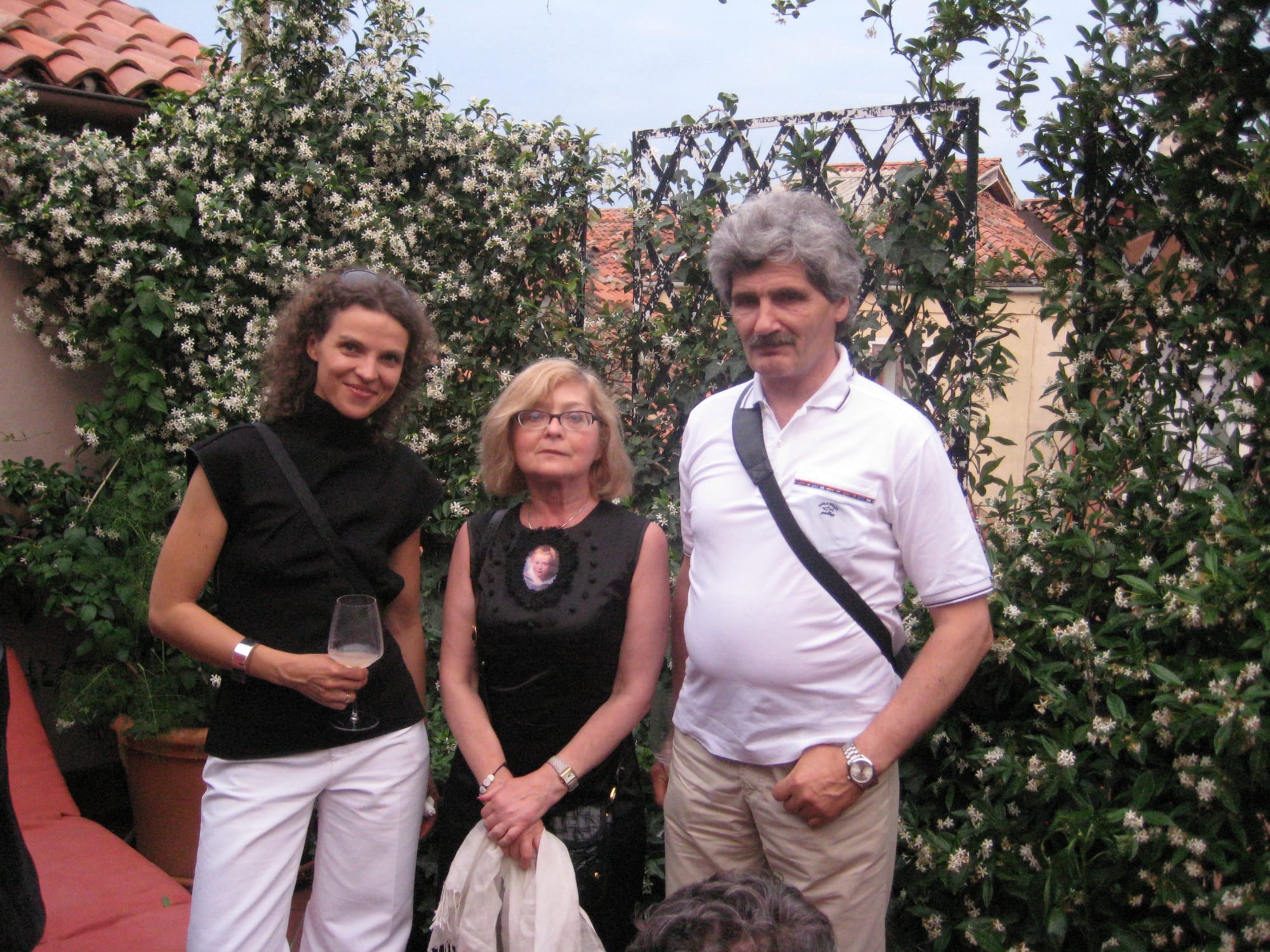 Laura Rutkutė with Eugenija and Saulius Sutkai, the supporters of the Lithuanian Pavilion. At the after party hosted by Danutė & Alian Mallart