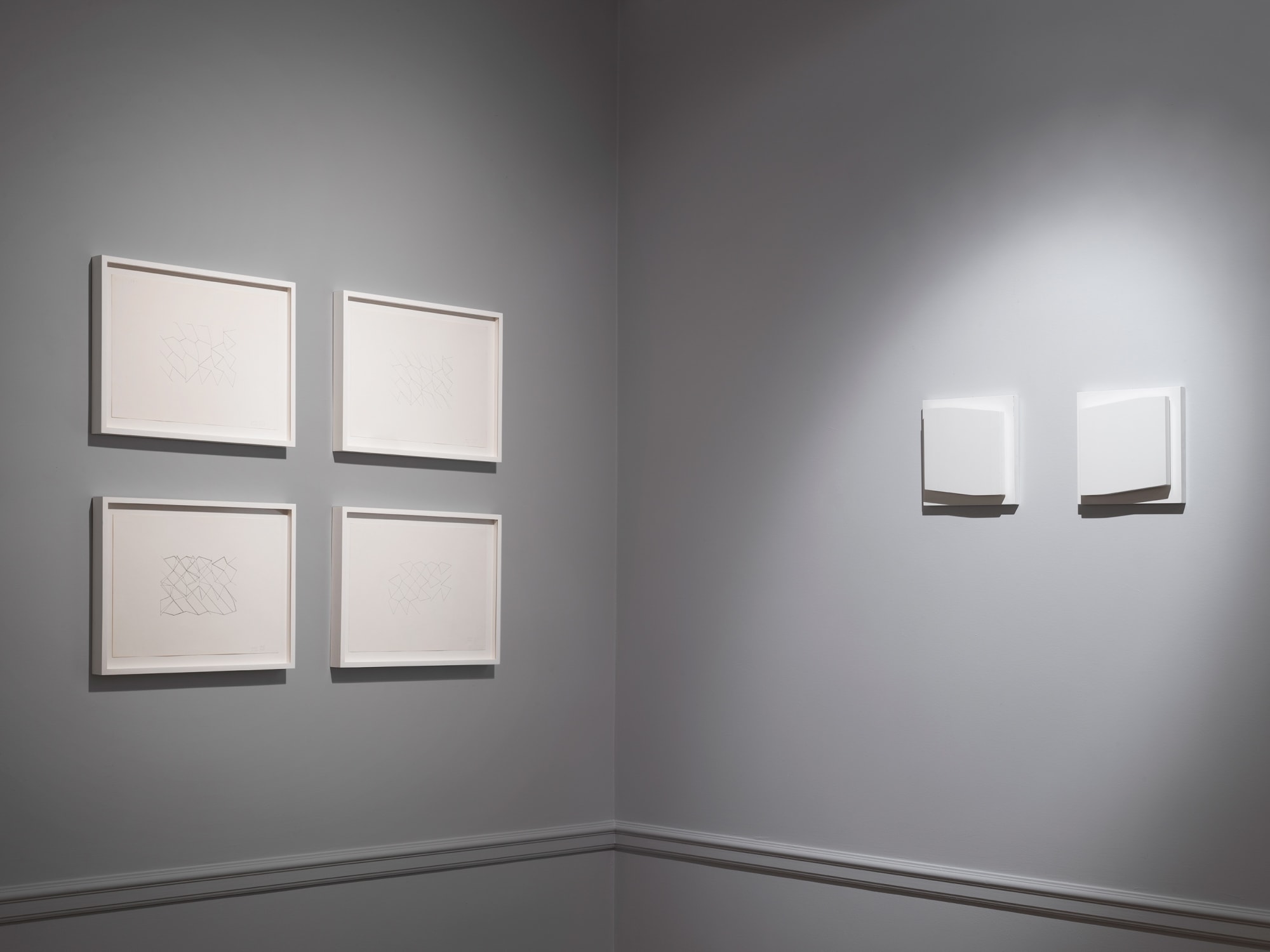 Four ink drawings by Elena Asins from 1978 and a wood dyptich also by Asins from 2005 to the right