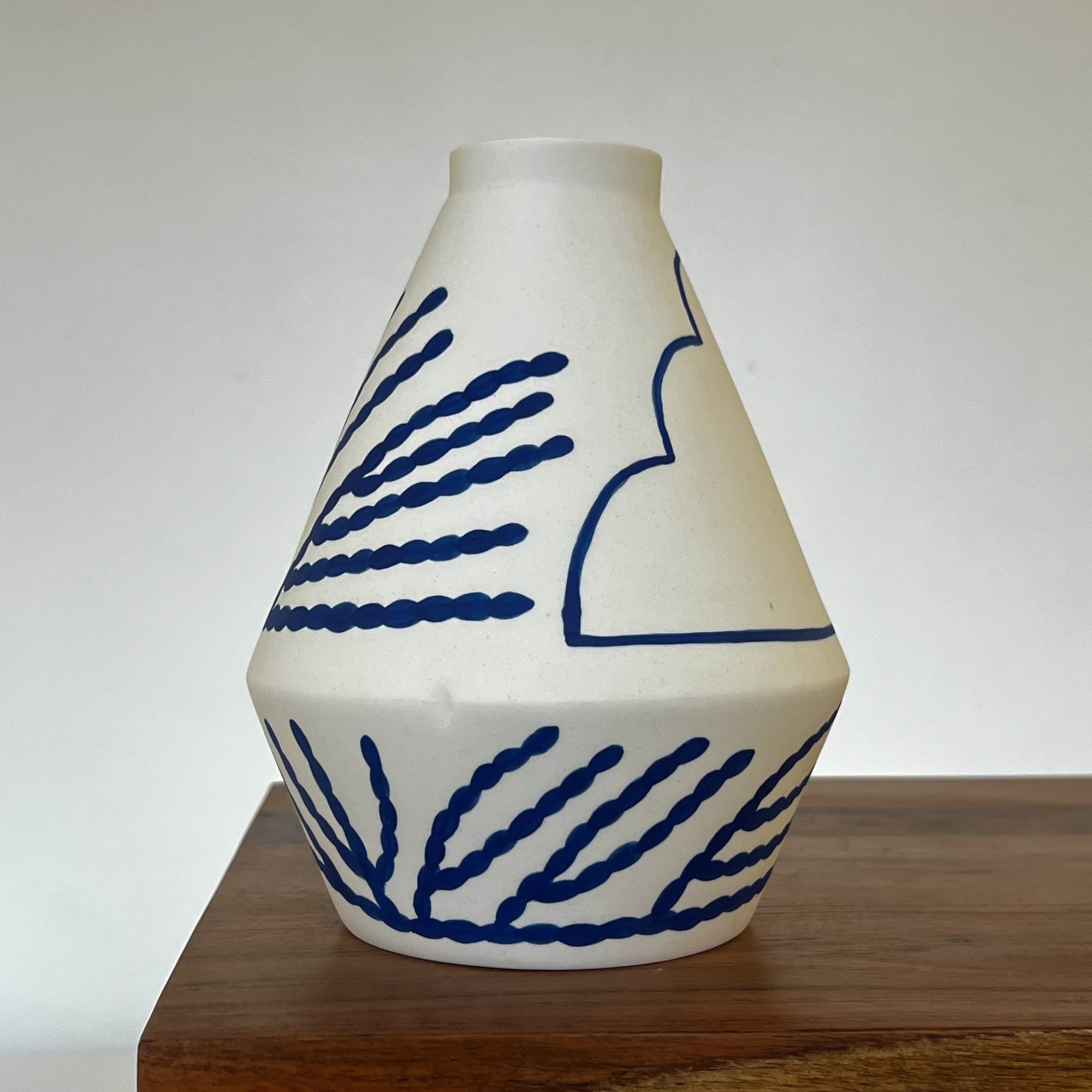 Sophie Alda ceramic vase diamond shaped with a blue handdrawn coral and cloud design