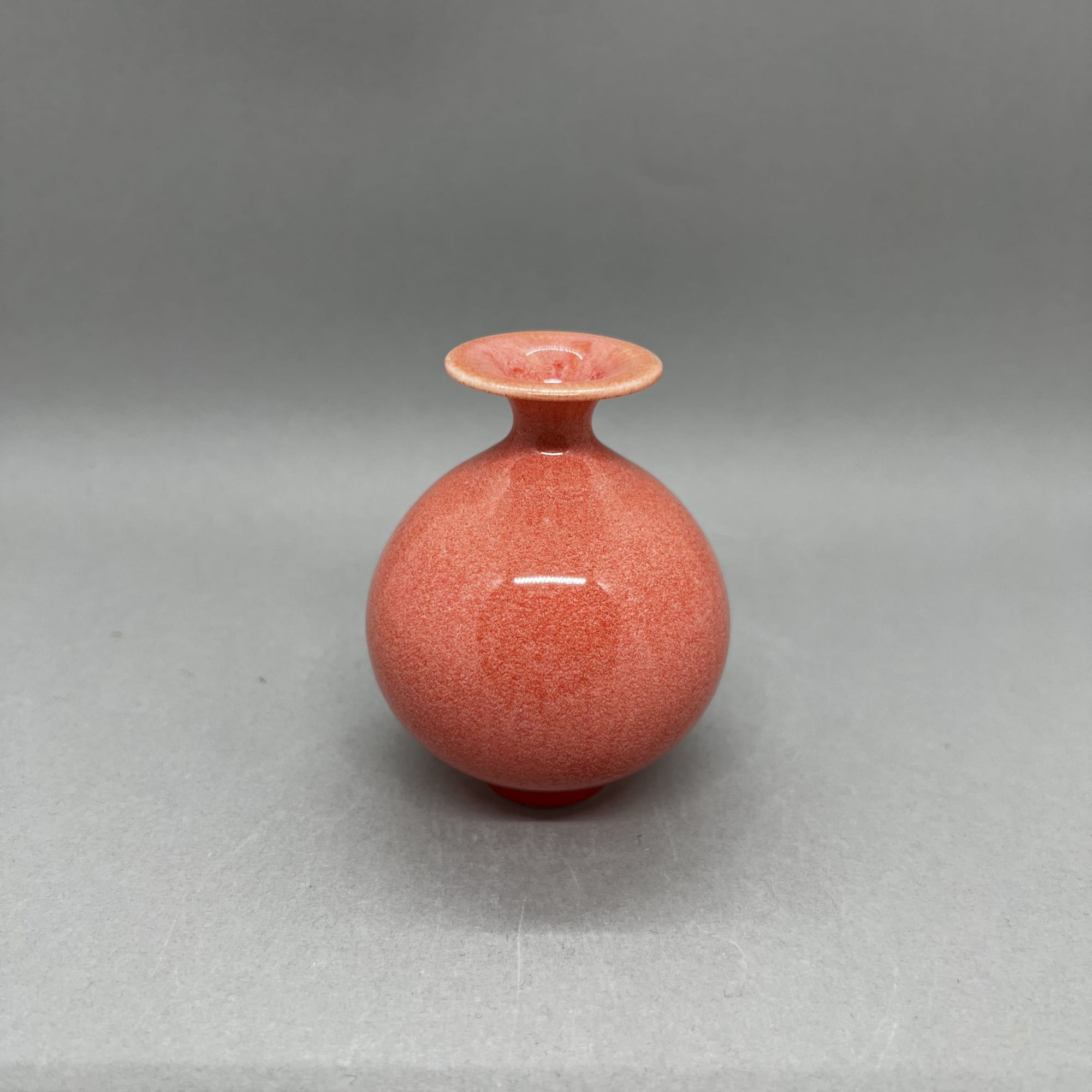 Yuta Segawa miniature rounded vase in coral with dished neck