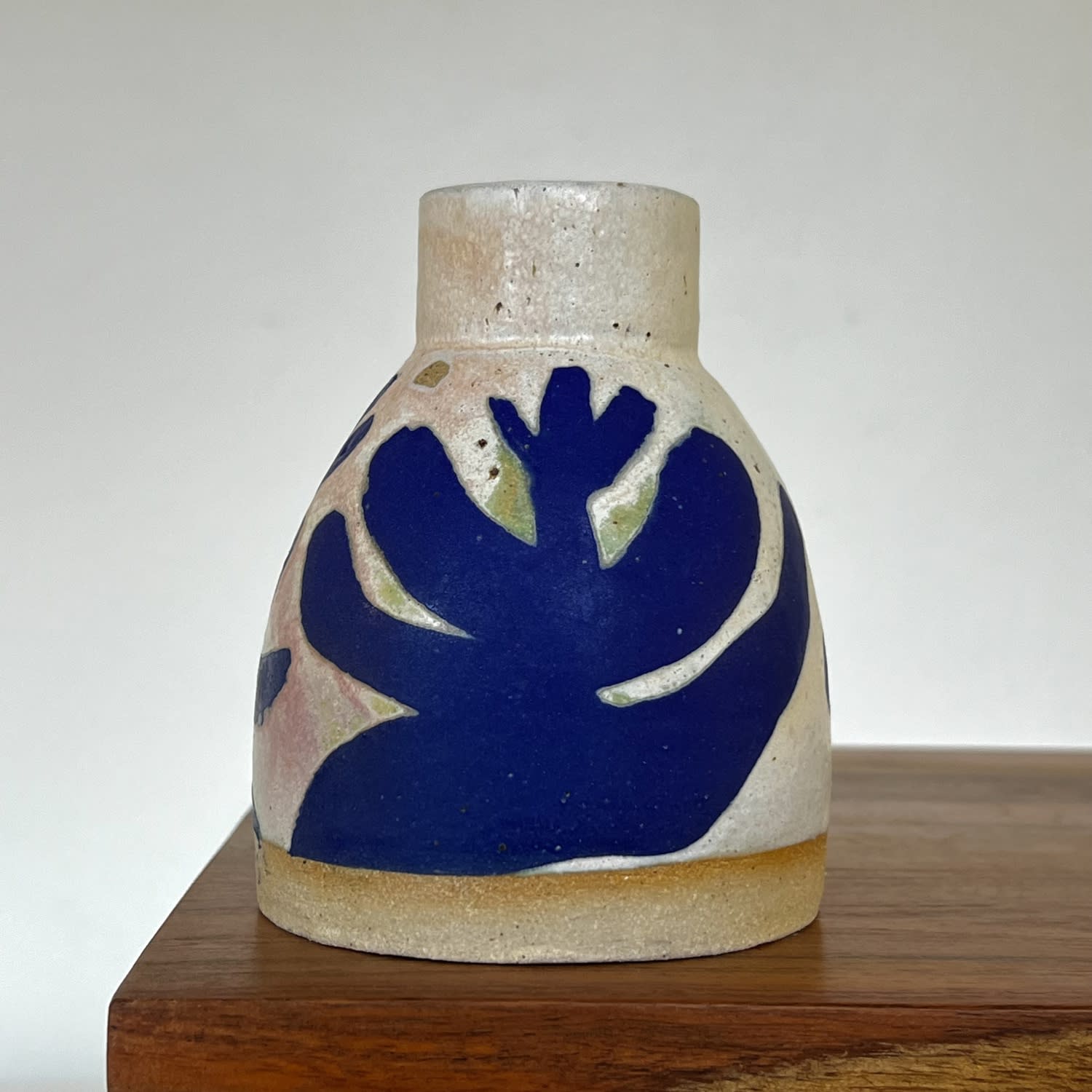 Sophie Alda ceramic vase bud shaped with and painted blue and white eucalyptus design