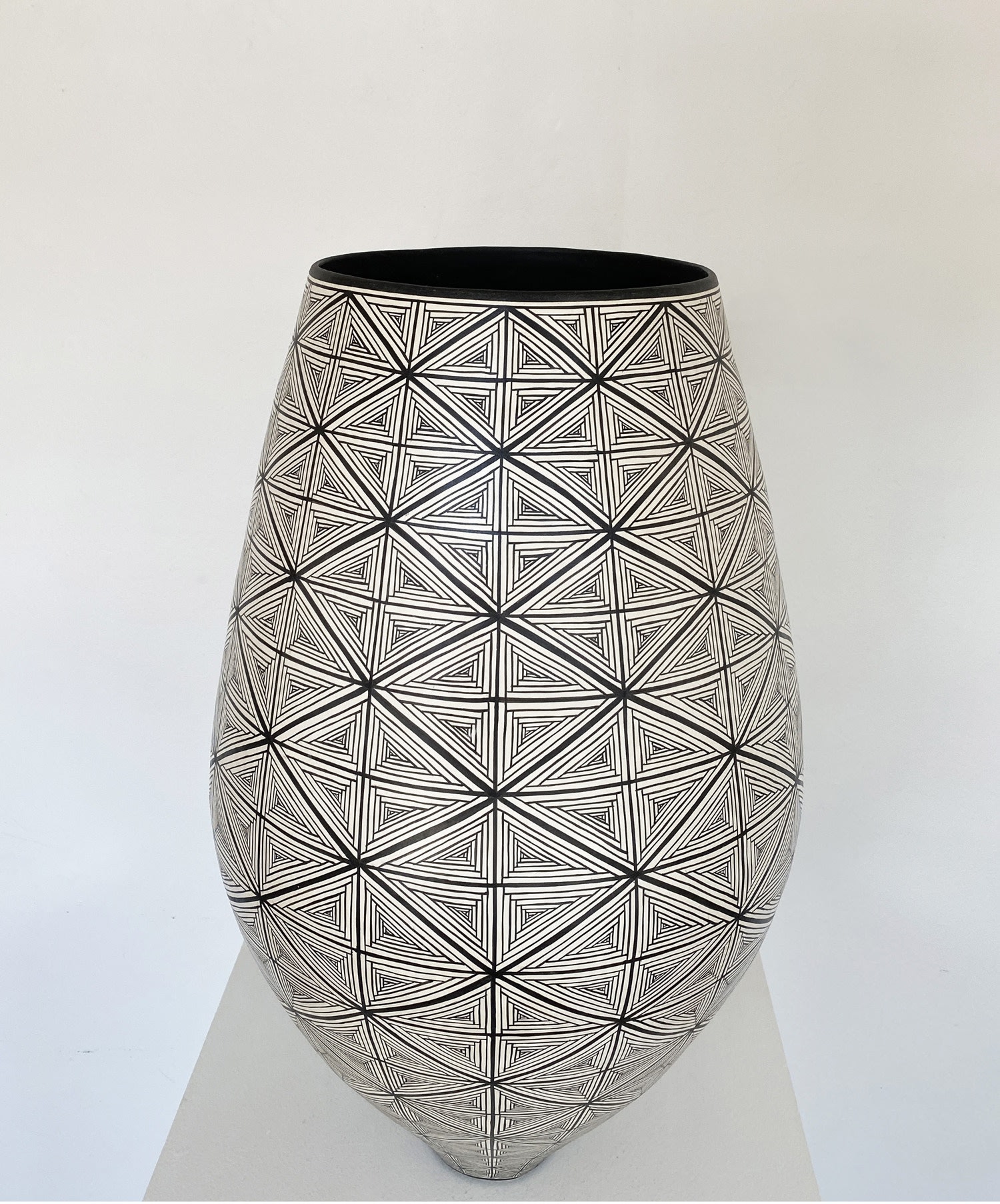 Ant & Di Edmonds - Tydd Pottery tall ceramic vessel with hand painted flag design in black and white