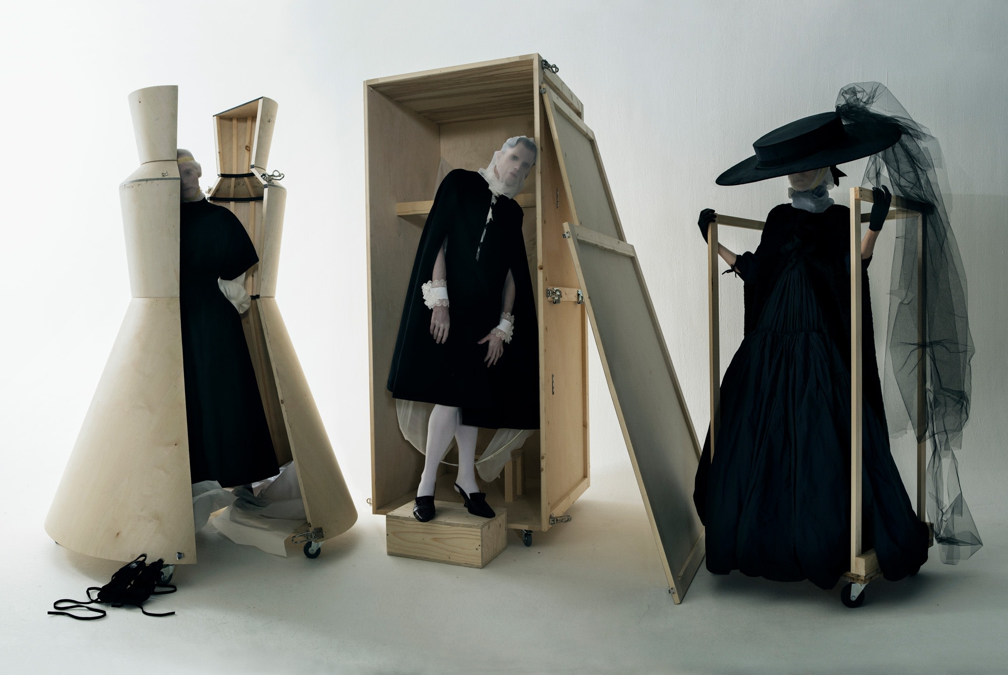 Tim Walker, Karen Elson, James Crewe & Sgàire Wood, crated for delivery to the V&A Museum. Fashion: Saint Laurent & Molly Goddard. Hat by Sarah Bruylant. Park Royal Studios. London, 2018