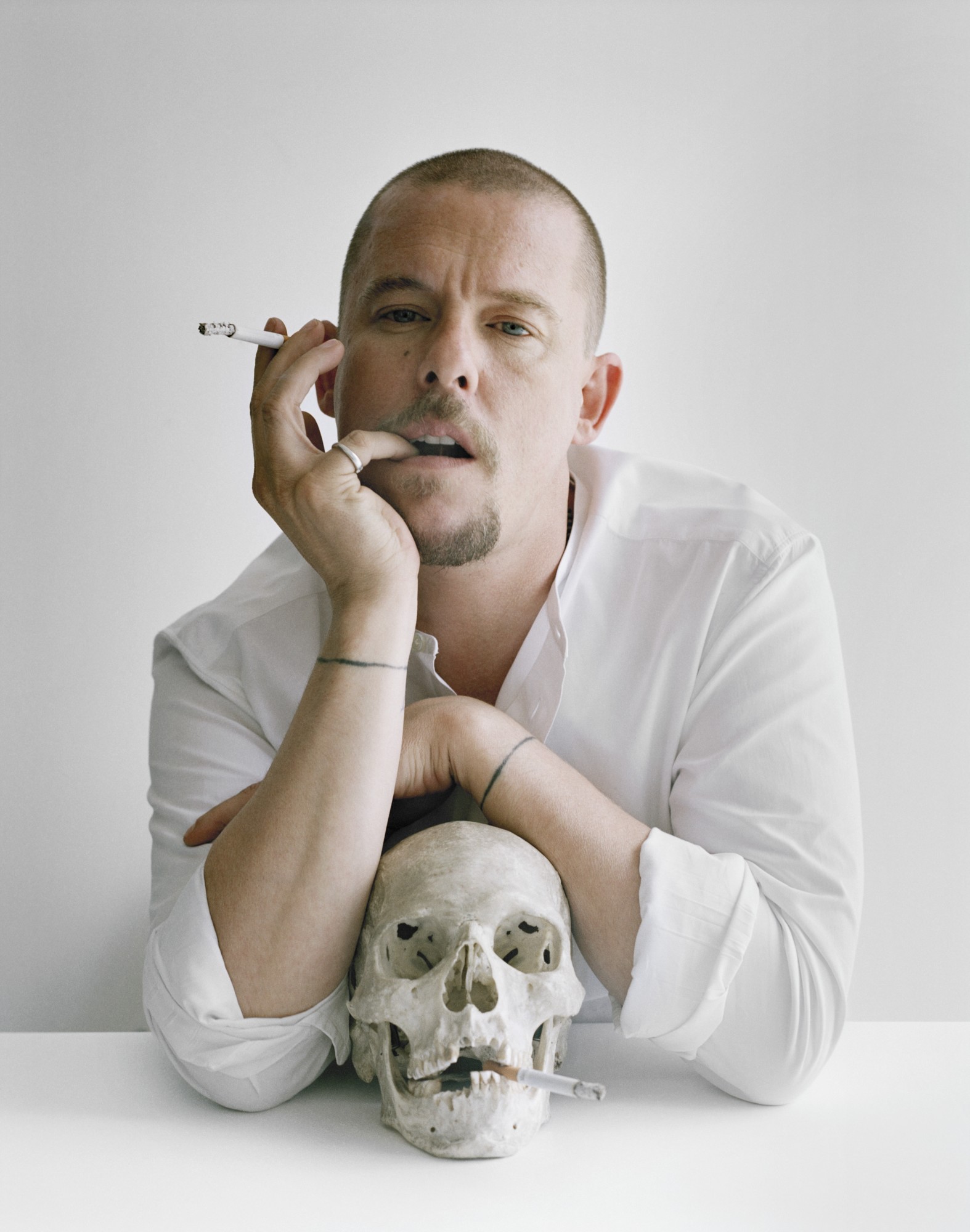 Tim Walker, Alexander McQueen with skull and cigarettes, Clerkenwell, London, 2009