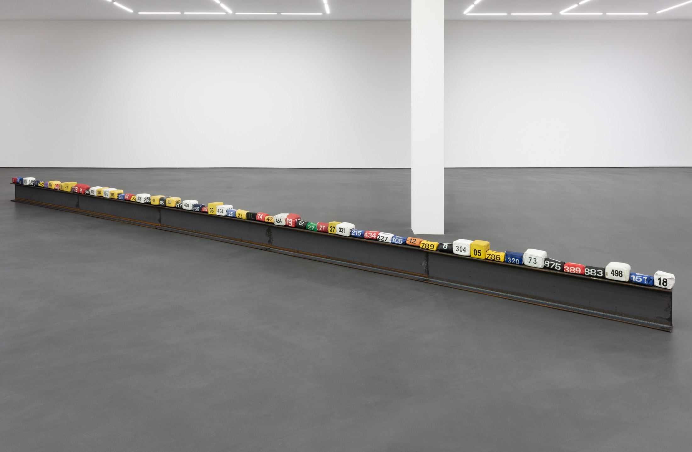 Prisms, 2022, 64 pouches (vinyl, magnets, styrofoam), 5 I-beams (IPE 300), dimensions variable (10 m long approx.), beams: 30 x 15 x 200 cm (11 3/4 x 5 7/8 x 78 3/4 in) each (5 parts) (JL 072)