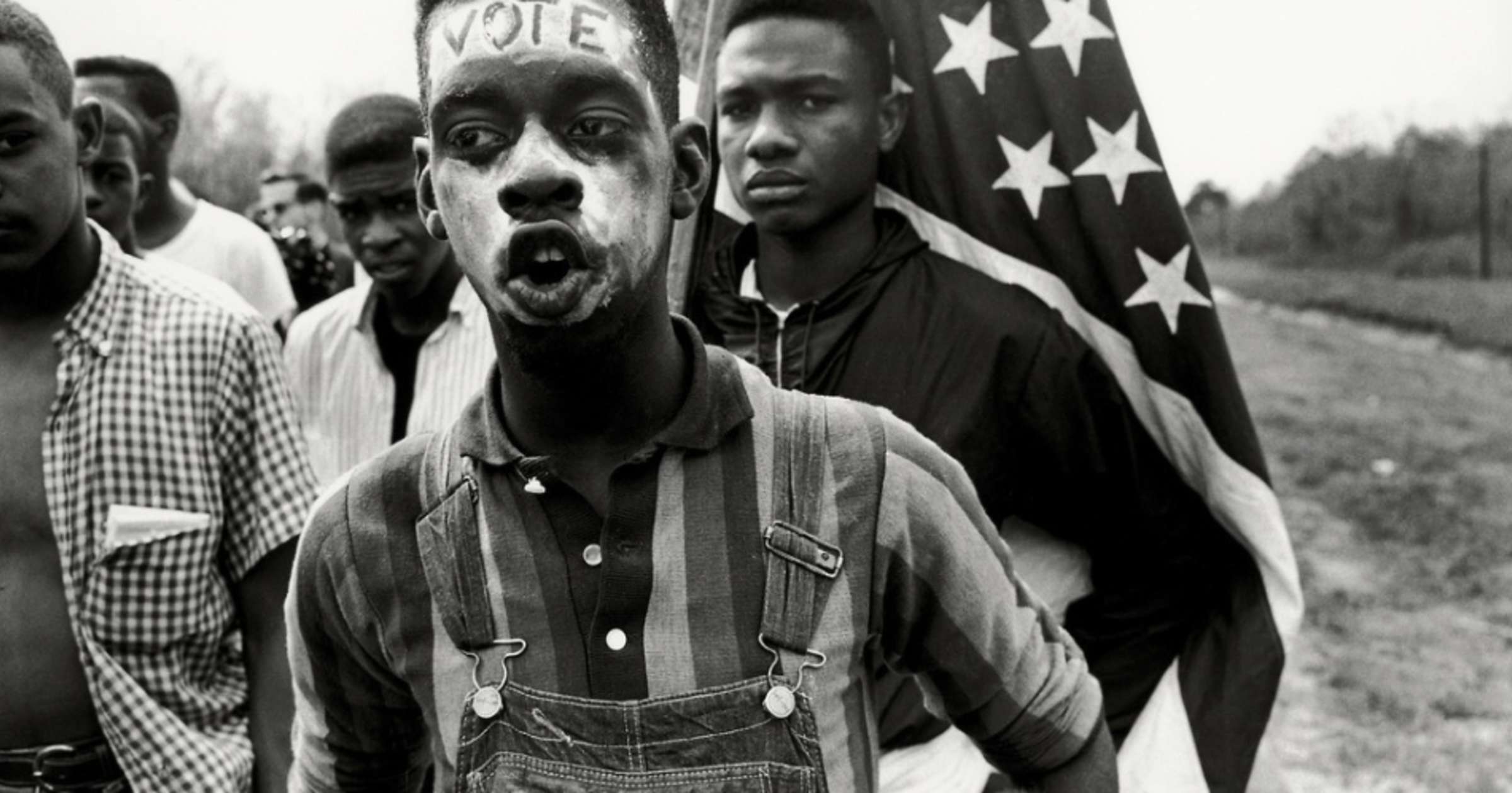 Bruce Davidson, Untitled, Time of Change (Young Man with Flag 