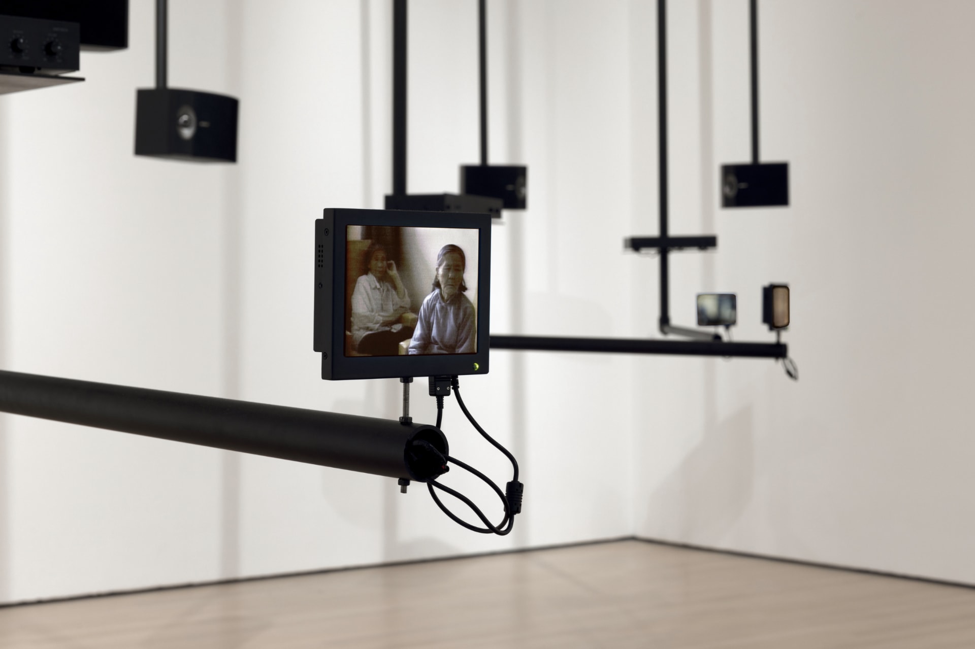Installation by Dara Birnbaum with many small video screens