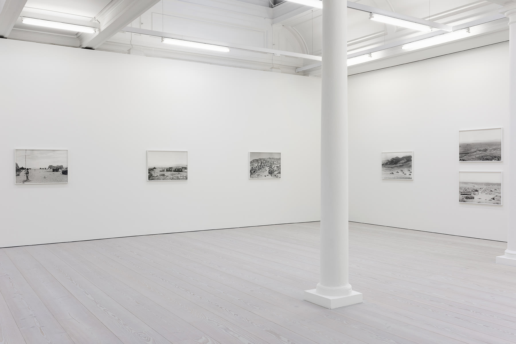 installation view of photographs by An-My Le