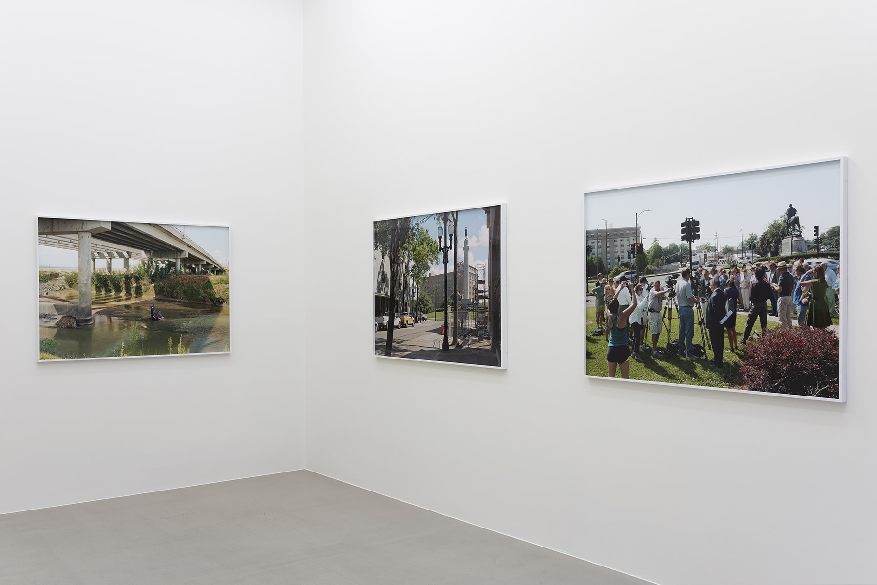 installation view of photographs by An-My Le