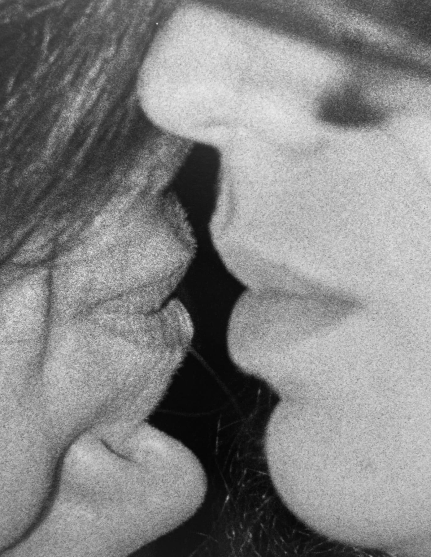 black and white photograph of two people about to kiss by Joanna Piotrowska