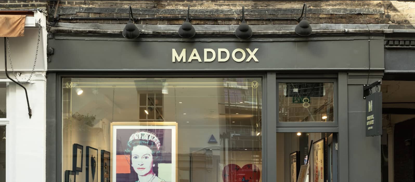 Andy Warhol’s “The Queen” hangs in the window of Maddox’s Shepherd Market Gallery, where there is plenty of blue chip art for sale.