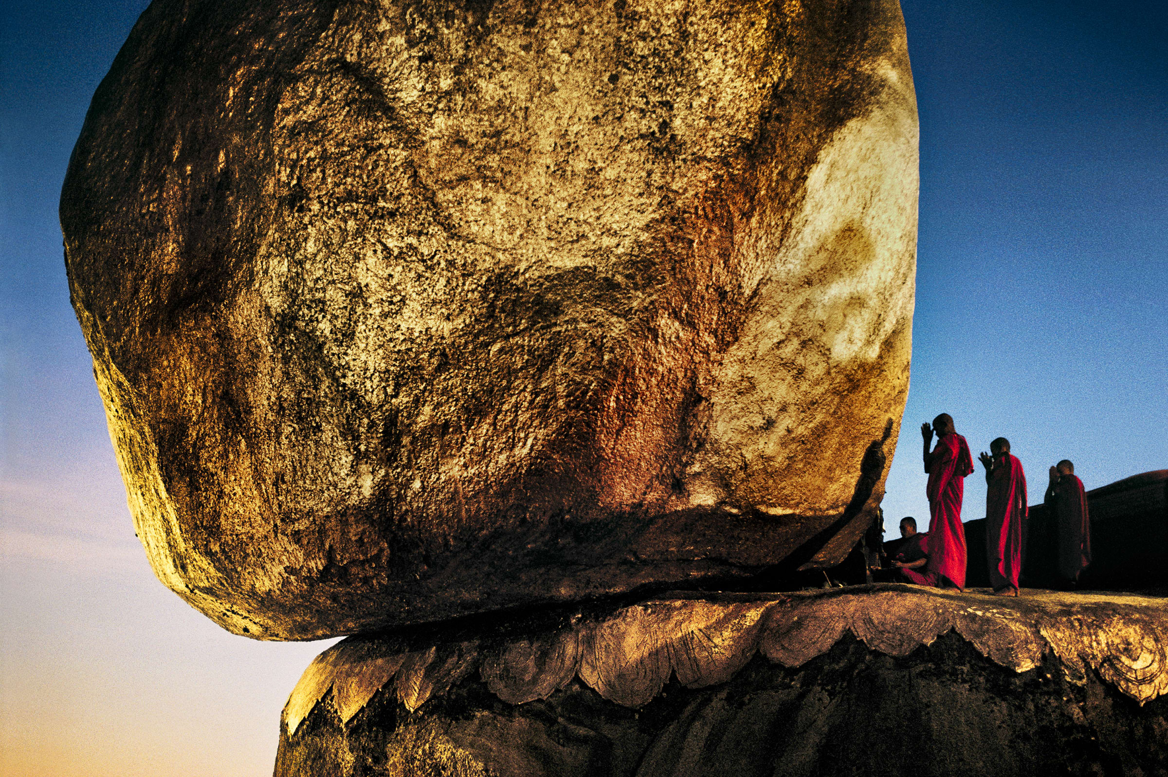 Steve Mccurry Monks Pray At Golden Rock 1994 Peter Fetterman Gallery
