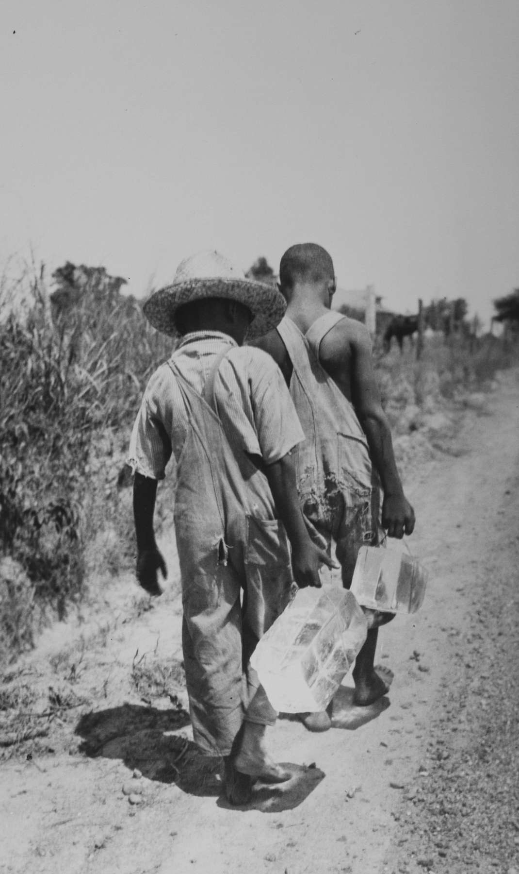 Eudora Welty Twenty Photographs Portfolio: Carrying Home the Ice, 1936