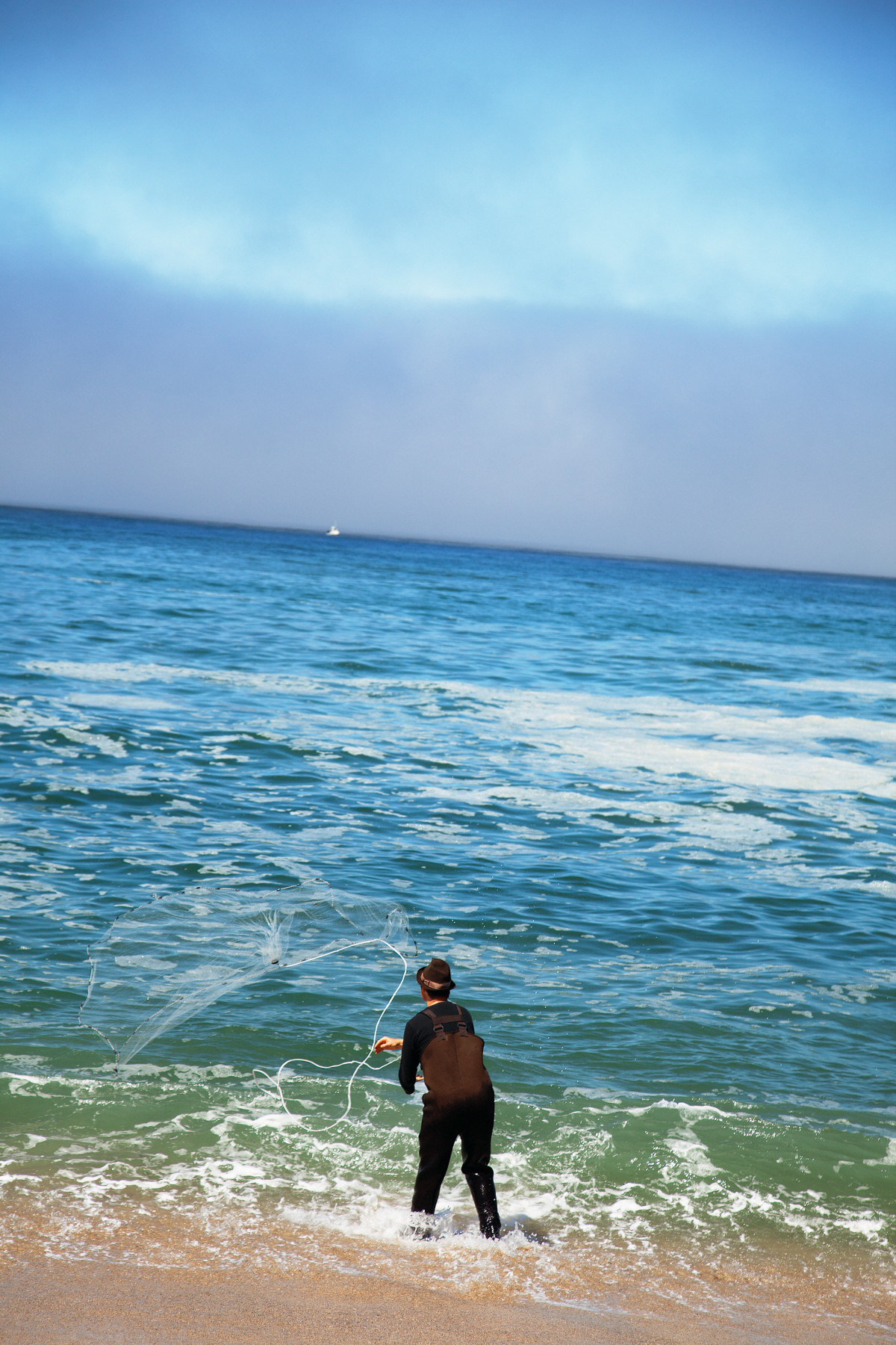 Kirk Lombard Casting a Net for Surf Smelt