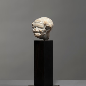 Greek grotesque head of a grimacing woman, c.3rd century BC