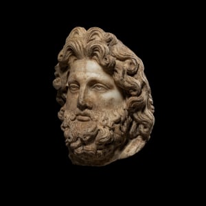 Roman head of a bearded god, c.2nd century AD