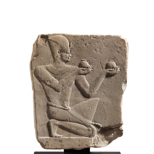Egyptian sculptor's trial piece of a kneeling pharaoh, Ptolemaic Period, c.334-30 BC