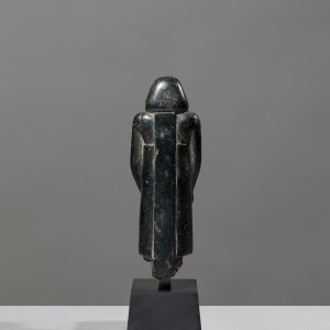 Egyptian theophorous figure, holding a seated statuette of Imhotep, Late Period, 27th-30th Dynasty, c.525-343 BC