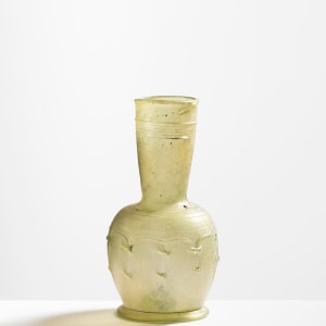 106. Late Roman-early Byzantine clear, pale olive green flask, c.6th-7th century AD