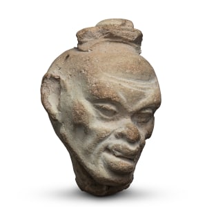 Hellenistic head of a comic slave, Smyrna, 1st Century BC to 1st Century AD