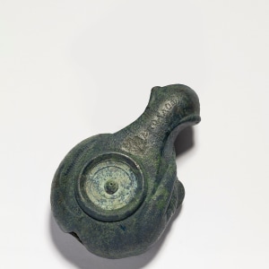 Roman oil lamp in the form of a sleeping hound, Imperial Period, c.1st century AD