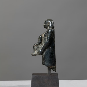 Egyptian theophorous figure, holding a seated statuette of Imhotep, Late Period, 27th-30th Dynasty, c.525-343 BC