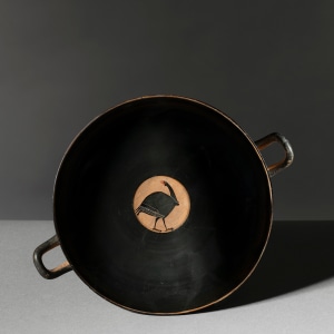 Greek black-figure kylix with ithyphallic guineafowl, Late 5th century BC