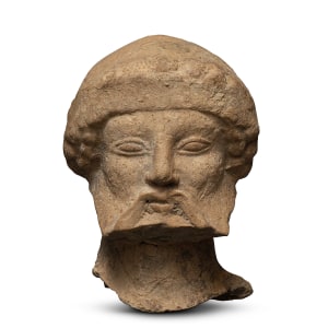 Greek head of a bearded male, South Italy, Medma, second quarter of the 5th century BC