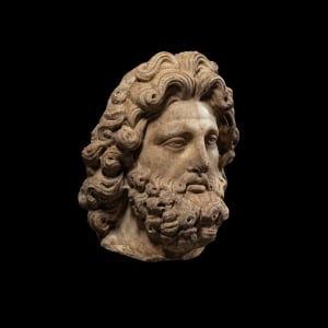 Roman head of a bearded god, c.2nd century AD