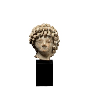 Hellenistic head of a youth, North Africa, c.3rd-2nd century BC