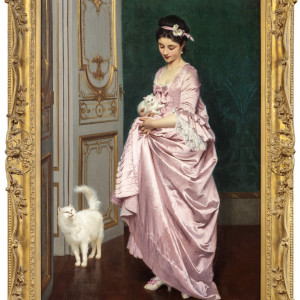 ELEGANT YOUNG WOMAN WITH TWO WHITE CATS