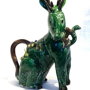 A CHINESE BISCUIT GLAZED 'DEER’ WATER DROPPER AND COVER, Kangxi (1662 – 1722)