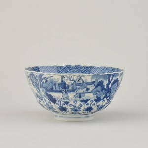 A CHINESE BLUE AND WHITE LOTUS-MOULDED BOWL, Kangxi 1662-1722