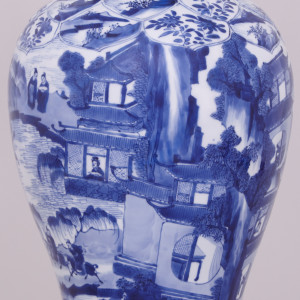A PAIR OF HIGHLY UNUSUAL, TALL AND FINE CHINESE BLUE AND WHITE VASES AND COVERS, Kangxi (1662-1722)