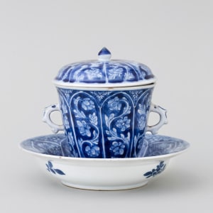 A CHINESE BLUE AND WHITE CHOCOLATE CUP, COVER, AND STAND, Kangxi (1662 – 1722)