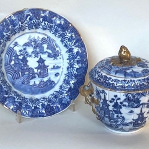 A PAIR OF UNUSUAL CHINESE BLUE AND WHITE POTS COVERS AND STANDS , Qianlong (1735 – 1796)