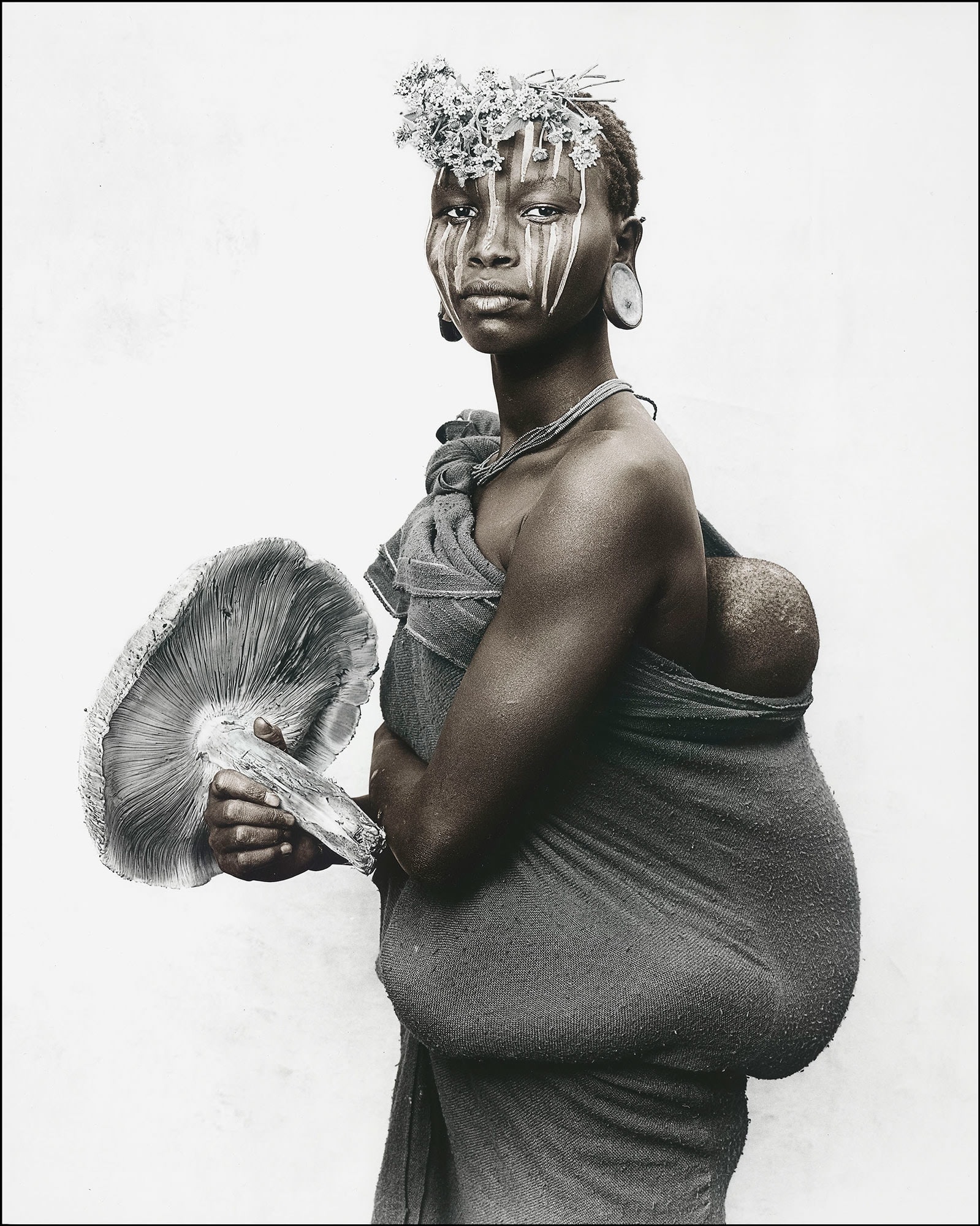 Mother with mushroom, Suri tribe, Ethiopia, 2018